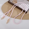 Close-up of pink PU leather phone strap with lychee texture and golden metal swivel hooks - Crossbody Chain / Pink (K5850)