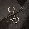 Polished silver metal keychain with devil heart pendant featuring horns and an arrow tail - Hollow Devil Heart Style (168)