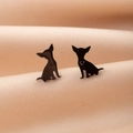 Black Chihuahua silhouette earrings with heart cutout on elegant champagne satin backdrop - Sitting Dog Hollow Heart (777) / Black
