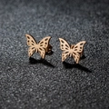 Elegant hollow butterfly stud earrings in rose gold finish on a black textured background - 268 Rose Gold