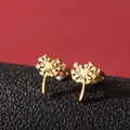 Elegant gold dandelion stud earrings made of stainless steel for women with polished finish - Gold
