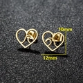Gouden hartvormige uitgesneden oorknopjes met golfontwerp, maat 12mm x 10mm - Hart Golf (153) / Goud