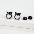 Detail view of matte black stainless steel owl stud earrings with matching backings - Black (273)