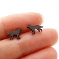 Detailed close-up of matte black labrador silhouette stud earrings held for size reference - Dog Style (364) / Black