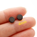 Sleek 4mm black round stud earrings in polished stainless steel for a minimalist look - 4mm / Black