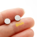 Polished silver stainless steel 8mm round stud earrings shown on fingers for scale - 4mm / Steel