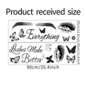 Detail van de muursticker met ogen, vlinders en tekst Everything Lashes Make Better - 30*90cm*2