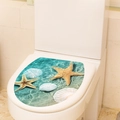 Detail of marine ocean theme toilet lid sticker with starfish and sea shells on white ceramic - Ocean Ecology Water Ripples (M-169) / 29x34cm