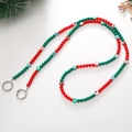 Dettaglio della catena natalizia in argilla polimerica con ciondoli festivi e moschettoni - Stile Motivo Babbo Natale Rosso Verde(K2146)