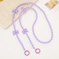 Purple beaded cross-body phone chain with bow accents and metal spring ring clasps - Purple Beaded Crossbody / Purple
