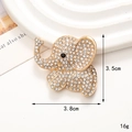 Sparkling elephant brooch with clear rhinestones on a gold base, width 3.8cm, height 3.5cm - D2092 Cute Small Elephant (Gold)