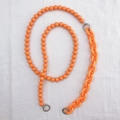 Detail of bright orange acrylic 2-in-1 crossbody phone chain with beads and thick links - Orange