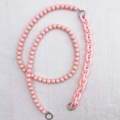 Detail of pink acrylic bead and plastic chain strap with silver metal rings for bags - Pink