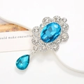 Elegante zeeblauwe kristallen broche met ovale edelsteen en druppelhanger - Legering / Zilveren Basis Blauw