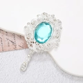 Detail of vintage silver pendant with blue gemstone and rhinestones on a white stand - Silver Base Blue Gem (D1336)