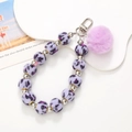 Elegante portachiavi con pompon viola leopardato con perle e chiusura a moschettone argento - Perline Leopardate (K2432) / Viola