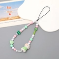 Niedliche Handy-Handschlaufe mit weißer Hasenfigur und pastellfarbenen Perlen - Handykette / Grüner Beflockter Hund Handy-Anhänger