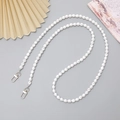 Detail shot of glossy white ABS pearl strap with silver lobster clasps for bags - Crossbody Chain / K1706 Twist Pearl