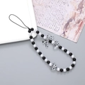 Detail of beaded phone strap with black and white resin beads and polka dot bow heart charms - Polka Dot Heart Phone Chain (K2907)