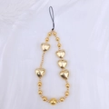 Golden heart-shaped beads phone charm lanyard with polished metallic finish and black cord - Gold Plated Heart (K3428)