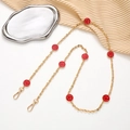 Golden crossbody chain with red enamel smiley face charms and lobster clasps - Red