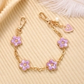 Cadena dorada con flores de esmalte púrpura, perla y dije de corazón para bolso o móvil - Cadena de mano / Morado