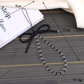 Beaded bowknot phone strap with black and clear acrylic pearls for mobile accessories - Black