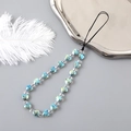 Bunte Herz Handyband mit irisierenden blauen Perlen auf einem Metalltablett - Grau Mehrfarbig (K3171)