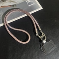 Elegant rose gold rhinestone mobile crossbody strap with heart clasp on leather texture - Pink