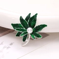 Detail of maple leaf brooch with green enamel finish and a center white pearl accent - Green Maple Leaf (D2514)