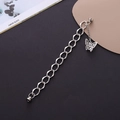 Silver metal chain bracelet with hollow butterfly pendant and round magnetic clasp - Metal Butterfly Magnetic Style (K1115)