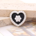 Detail of a heart-shaped black enamel charm with white camellia flower and pearl trim - Enamel Pearl Camellia - Silver White (D2648)