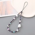 Detail of handmade beaded phone strap with baroque pearls and purple glass beads - Purple