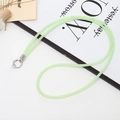 Detail of light green glitter crossbody phone strap with a silver metal clasp hook - Green