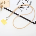 Detail of champagne gold glitter lanyard with silver metal clasp and plastic pad - Champagne