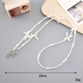 Elegant 60cm pearl crossbody phone chain featuring five beige decorative silk bows - White Bow (K3664)