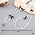 Crossbody phone strap with white pearls and black ribbon bows, silver metal clasps, 60cm length - Black Bow (K3665)