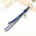 Llavero de cuero trenzado azul y negro con colgante de corazón y cierre de plata - Azul Cielo Y Negro