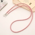 Close-up of pink woven denim phone lanyard with dual silver metal lobster clasps - Crossbody Chain / Pink Denim Crossbody Chain