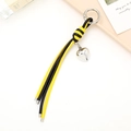 Porte-clés en cuir tressé noir et jaune avec breloque coeur argentée et fermoir ressort - Porte-clés Tressé Nœud Diamant (K3917) / Noir+Jaune