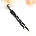 Fashionable black leather knotted keychain with silver ring for bags and phone cases - Black