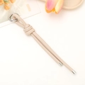 Beige PU leather bowknot keychain with silver metal ring for handbags and phones - Off White