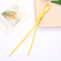 Macro shot of bright yellow braided rope strap with white speckles and plastic aglets - Yellow