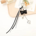 Black PU leather bow keychain with heart clasp and checkers ribbon tassel pendant - Black Bow