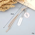 Detail of bohemian woven rope keychain with pink glitter O-letter and engraved oval pendant - Letter O (K4286)