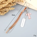 Letter T keychain with orange woven rope and pink marble pendant detail, 26cm length - Letter T (K4291)