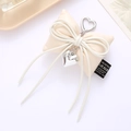 Beige cream-style PU leather bow keychain with heart pendant and metal clasp - Cotton Filled Leather Bow Pendant White (K4114)
