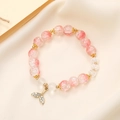 Pink crystal beaded bracelet with golden fishtail pendant on beige satin background - Ice Crackle Bead Pink (K3390)