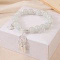 Elegant beaded bracelet with silver fan and tassel charms on white gift box - White Fan Tassel Bracelet (K4236)