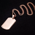Macro shot of rose gold rectangular dog tag pendant on box chain with mirror finish - Pendant with Ball Chain / Rose Gold